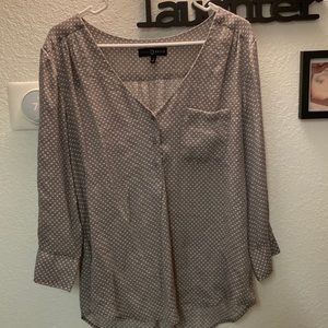 Fred David brand grey and white pockadot v-neck 3 button blouse.